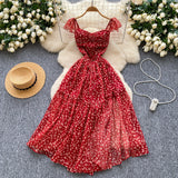 Fongt Sweet Design With A Knotted Bow Tie With Bare Back To The Waist Of A Floral Dress
