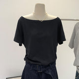 Star Has A Loose Short-Sleeved T-Shirt With Missing Shoulders In The Same Style. The New Beautiful High-End Top In Summer 2024 For