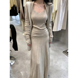 Fongt The Autumn Of 2025, The New Women's Long-Sleeved Knitted Cardigan Is Hoisted With A High-Rise Half-Body Skirt.
