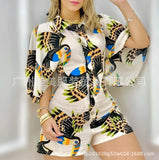 New Printed Lapel With A Row Of Buttons, Middle-Sleeved Shirt And One-Piece Trousers From Stock-Outfit