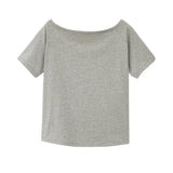 Star Has A Loose Short-Sleeved T-Shirt With Missing Shoulders In The Same Style. The New Beautiful High-End Top In Summer 2024 For
