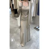 Fongt The Autumn Of 2025, The New Women's Long-Sleeved Knitted Cardigan Is Hoisted With A High-Rise Half-Body Skirt.