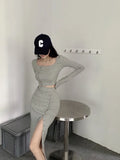Fongt New Suit Hottie Exposed Umbilled Long-Sleeved Top + High Waist Open Half-Body Bag Skirt Two
