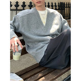 Fongt And Winter Wearing Black Ash Splicing Colliding College Style Cardigan Sweater Over The Couple Niche Oversize Knitwear Shirt