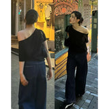 Star Has A Loose Short-Sleeved T-Shirt With Missing Shoulders In The Same Style. The New Beautiful High-End Top In Summer 2024 For
