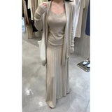 Fongt The Autumn Of 2025, The New Women's Long-Sleeved Knitted Cardigan Is Hoisted With A High-Rise Half-Body Skirt.